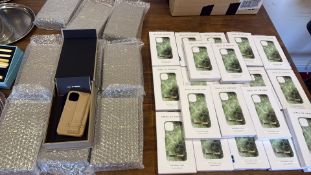 A quantity of Ideal of Sweden iPhone 12 mini cases, including Crystal Green Skya designs