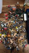 A quantity of painted lead toy soldiers, animals and accessories, including a traction engine