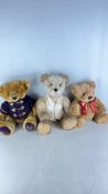 A group of Harrods commemorative teddy bears, including a 2000 example in purple jacket and two