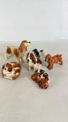 A group of Royal Doulton bone china dog models