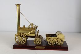 Brass rocket steam engine model