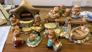 A quantity of Pendelfin rabbit figures and scenic bases