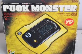 CCL Puck Monster handheld electronic game, boxed