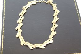 Bijoux BEC London gilt metal necklace, with maker’s pouch
