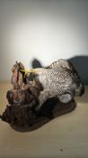Taxidermy birds of prey hunting tableau on driftwood base
