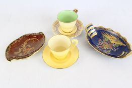 A group of Carlton Ware ceramics, including tea cups and leaf dishes