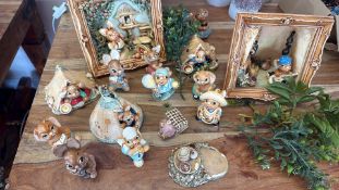 A group of Pendelfin rabbit figures and diorama scenes