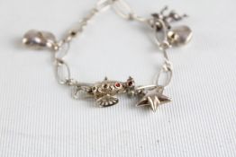 Silver charm bracelet - 6 charms