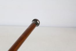 Silver top walking stick