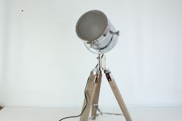 Chrome spotlight on wooden base