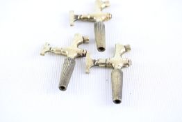 3 brass barrell taps