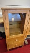 Modern light oak wood glazed cabinet with granite top and two drawers