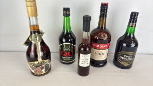 Group of assorted spirits and fortified wines, including Croft, Bardinet, and QC