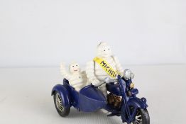 Cast iron Michelin man motorbike & sidecar