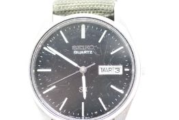 Gents Seiko Quartz 5H23-8A00 Watch with day & date
