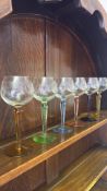 Set of etched glass goblets with coloured stems