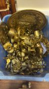 A quantity of mixed brassware including an embossed tray, vessels, bells and fittings