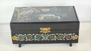 Oriental lacquered musical jewellery box