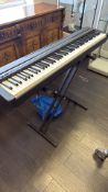 Yamaha Digital Piano on X-Frame Stand with Sustain Pedal