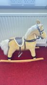 Plush rocking horse with leatherette tack and wood