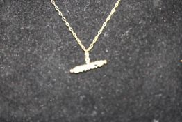 9ct Gold chain & pendant set with precious gem stones to spell 'DEAREST' Weight 1.2g