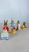 A group of Royal Doulton Bunnykins porcelain figur