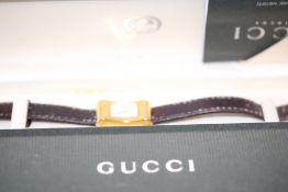 An original Gucci ladies wristwatch with box & war