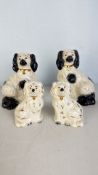 Group of Staffordshire porcelain spaniel figures, impressed England mark