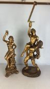 A pair of gilt-metal figural table lamps
