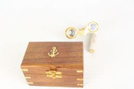 Boxed brass mother of pearl opera glasses