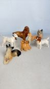 A group of Beswick ceramic dog models