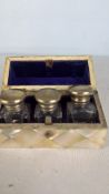 Mother-of-pearl inlaid necessaire with three glass