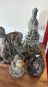 Group of cast stone duck garden ornaments