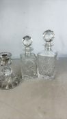 Group of cut glass decanters and a pressed-glass c