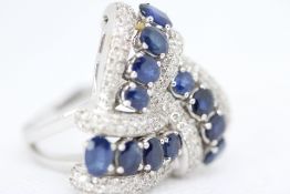 Large & impressive 18ct White gold ring set with d