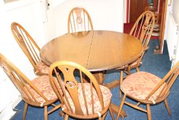 Ercol table with 4 chairs & 2 carvers with swan de