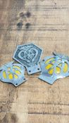 Three AA (Automobile Association) metal and enamel motor badges