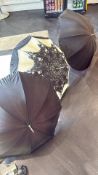 Four decorative parasols with painted and patterned canopies