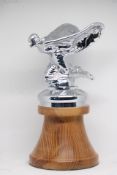 Car mascot in the style of Rolls Royce 'kneeling'