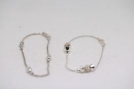 2 Silver bracelets