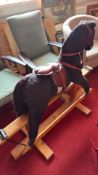 Plush rocking horse with leather tack and pine rocking stand