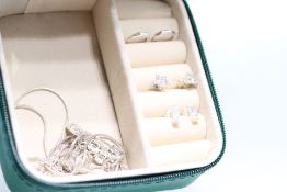 Small jewellery box containing silver jewellery