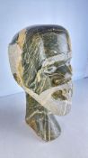 Carved Stone Head-and-Bust Sculpture