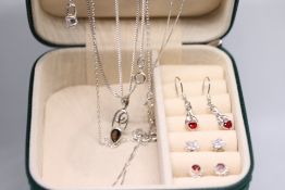 Small jewellery box containing silver jewellery