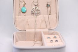 Small jewellery box containing silver jewellery