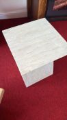Two pale stone occasional tables, one pedestal and one Z-form.