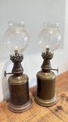 Two French brass ‘Lampe Feutre Olympe’ spirit lamps with glass globes