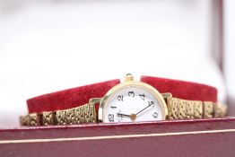 Ladies Gold Plated Rotary watch in box with bookle