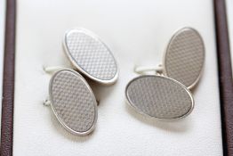 Boxed pair of silver cufflinks