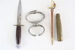 Group of daggers and martial accessories, including AJAX STEEL knuckle-duster